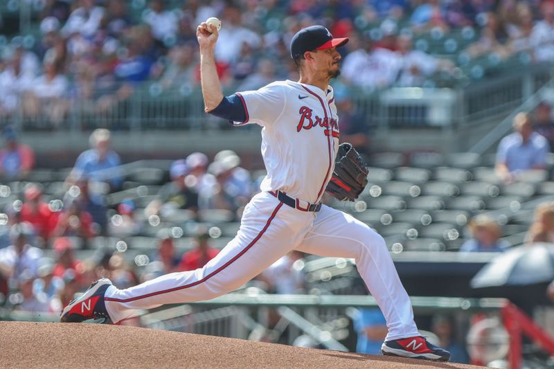 Sep 28, 2025; Cumberland, Georgia, USA; Atlanta Braves pitcher Charlie Morton (50) pitches the ball against the Pittsburgh Pirates during the first inning at Truist Park. Mandatory Credit: Jordan Godfree-Imagn Images