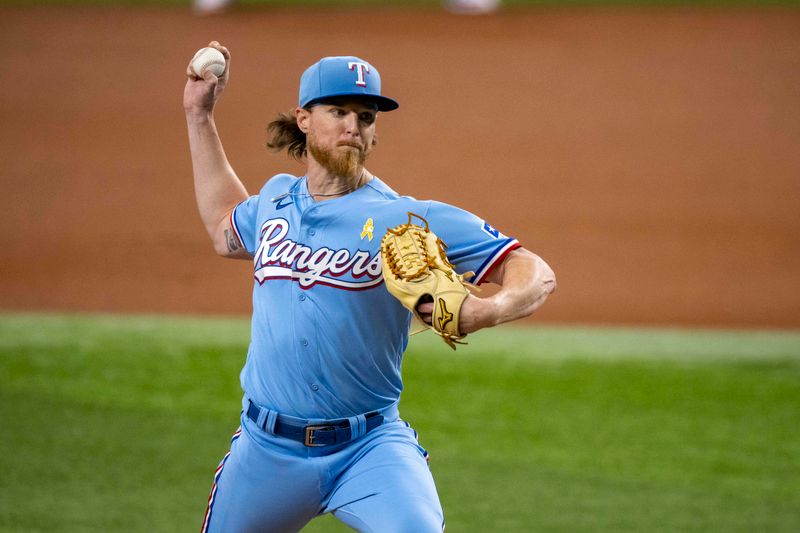 Sep 3, 2023; Arlington, Texas, USA; Texas Rangers starting pitcher Jon Gray (22) pitches against the Minnesota Twins during the first inning at Globe Life Field. Mandatory Credit: Jerome Miron-USA TODAY Sports