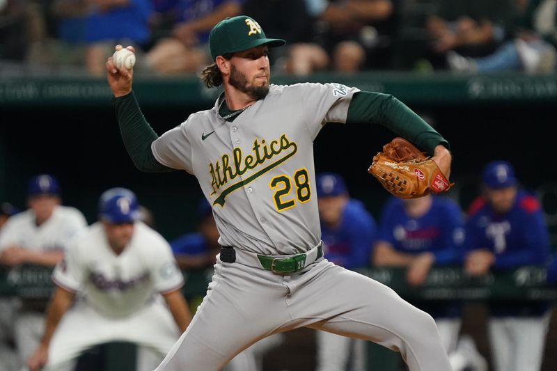Apr 28, 2025; Arlington, Texas, USA; Athletics pitcher Mitch Spence (28) throws to the plate against the Texas Rangers during the sixth inning at Globe Life Field. Mandatory Credit: Raymond Carlin III-Imagn Images