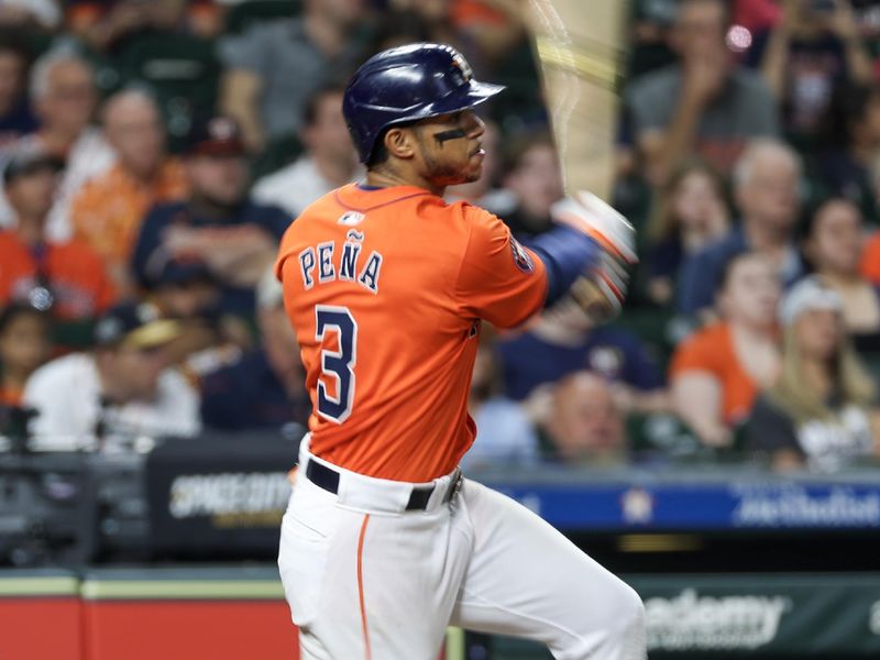 May 17, 2024; Houston, Texas, USA; Houston Astros shortstop Jeremy Pena (3) bats against the Milwaukee Brewers in the seventh inning at Minute Maid Park. Mandatory Credit: Thomas Shea-USA TODAY Sports