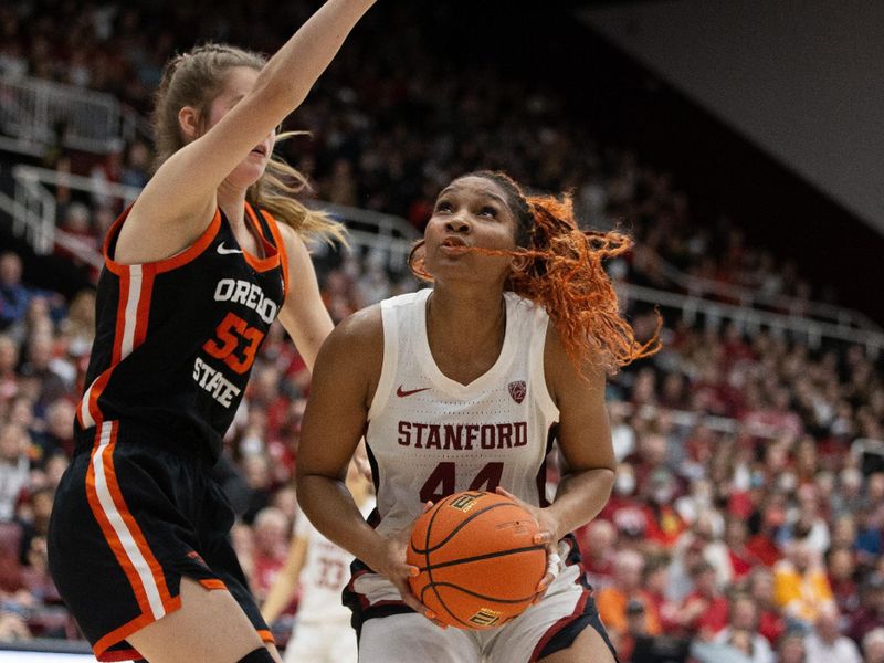 Jan 21, 2024; Stanford, California, USA; Stanford Cardinal forward Kiki Iriafen (44) drives past Oregon State Beavers forward Kelsey Rees (53) during the fourth quarter at Maples Pavilion. Mandatory Credit: D. Ross Cameron-USA TODAY Sports