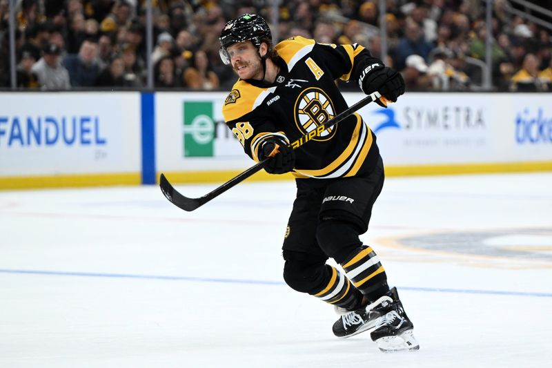 Nov 9, 2024; Boston, Massachusetts, USA; Boston Bruins right wing David Pastrnak (88) takes a shot against the Ottawa Senators during the first period at TD Garden. Mandatory Credit: Brian Fluharty-Imagn Images