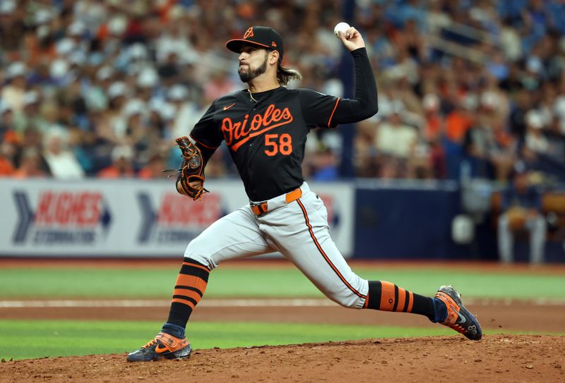 Aug 11, 2024; St. Petersburg, Florida, USA;  Baltimore Orioles pitcher Cionel Perez (58) throws a pitch against the Tampa Bay Rays during the seventh inning at Tropicana Field. Mandatory Credit: Kim Klement Neitzel-USA TODAY Sports