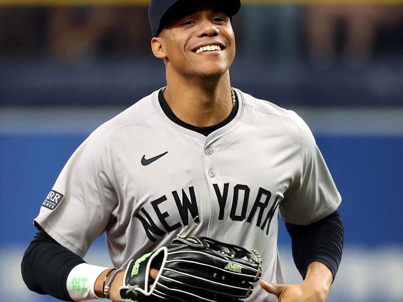 May 10, 2024; St. Petersburg, Florida, USA;  New York Yankees outfielder Juan Soto (22) smiles at the end of the first inning against the Tampa Bay Rays at Tropicana Field. Mandatory Credit: Kim Klement Neitzel-USA TODAY Sports