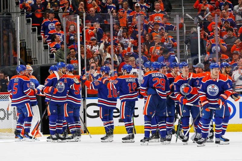 May 1, 2024; Edmonton, Alberta, CAN; The Edmonton Oilers celebrate a 4-3 win over the Los Angeles Kings and a 4-1 series win in game five of the first round of the 2024 Stanley Cup Playoffs at Rogers Place. Mandatory Credit: Perry Nelson-USA TODAY Sports