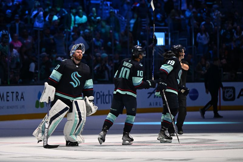 Feb 16, 2023; Seattle, Washington, USA; The Seattle Kraken celebrate after defeating the Philadelphia Flyers at Climate Pledge Arena. Seattle defeated Philadelphia 6-2. Mandatory Credit: Steven Bisig-USA TODAY Sports