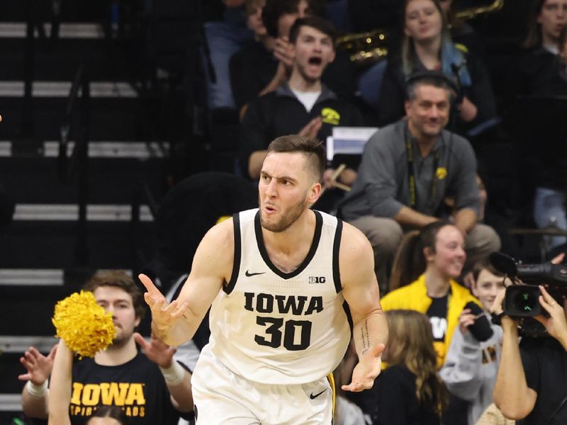 Jan 15, 2023; Iowa City, Iowa, USA; Iowa Hawkeyes guard Connor McCaffery (30) reacts during their game with the Maryland Terrapins at Carver-Hawkeye Arena. Mandatory Credit: Reese Strickland-USA TODAY Sports