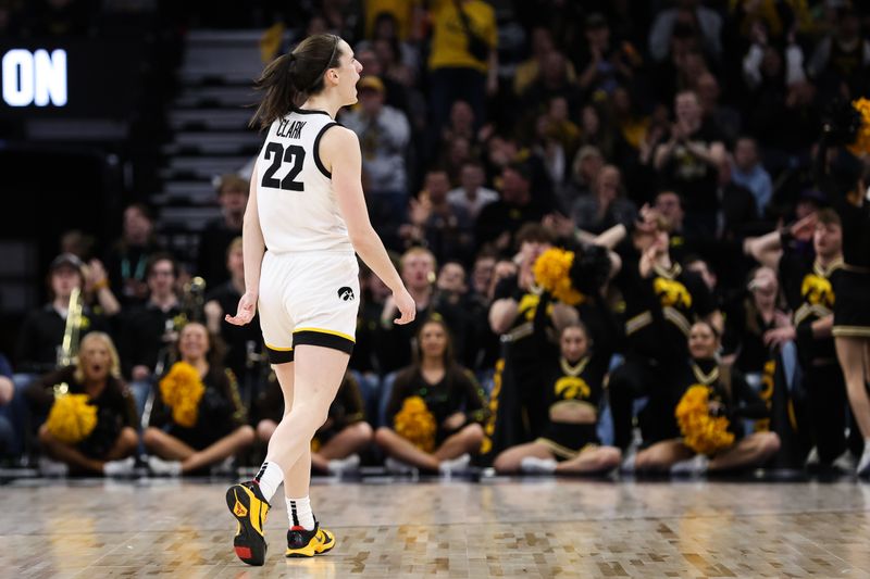 Mar 5, 2023; Minneapolis, MINN, USA; Iowa Hawkeyes guard Caitlin Clark (22) celebrates her shot against the Ohio State Buckeyes during the first half at Target Center. Mandatory Credit: Matt Krohn-USA TODAY Sports