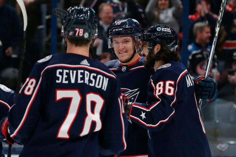 Feb 23, 2024; Columbus, Ohio, USA; Columbus Blue Jackets left wing Dmitri Voronkov (10) celebrates his goal against the Buffalo Sabres during the first period at Nationwide Arena. Mandatory Credit: Russell LaBounty-USA TODAY Sports