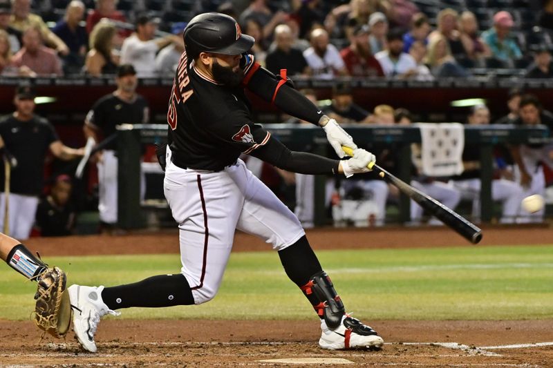 May 8, 2023; Phoenix, Arizona, USA;  Arizona Diamondbacks third baseman Emmanuel Rivera (15) singles in the fourth inning against the Miami Marlins at Chase Field. Mandatory Credit: Matt Kartozian-USA TODAY Sports