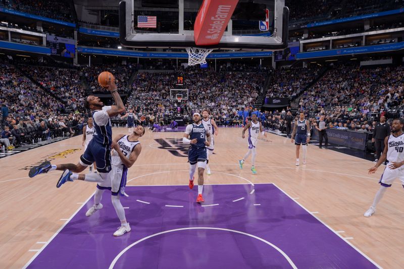 SACRAMENTO, CA - MARCH 29:  Derrick Jones Jr. #55 of the Dallas Mavericks goes to the basket during the game on March 29, 2024 at Golden 1 Center in Sacramento, California. NOTE TO USER: User expressly acknowledges and agrees that, by downloading and or using this Photograph, user is consenting to the terms and conditions of the Getty Images License Agreement. Mandatory Copyright Notice: Copyright 2024 NBAE (Photo by Rocky Widner/NBAE via Getty Images)