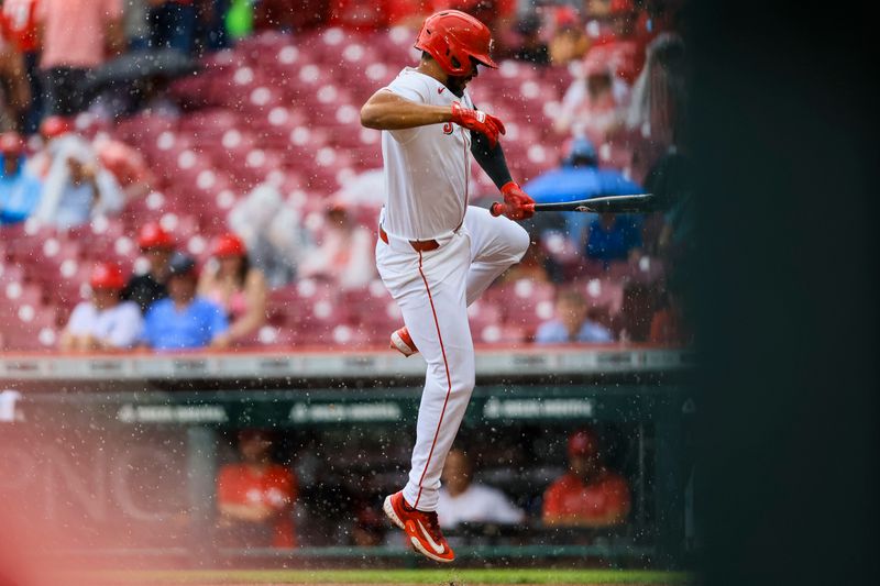 Aug 18, 2024; Cincinnati, Ohio, USA; Cincinnati Reds designated hitter Jeimer Candelario (3) reacts after getting hit by a wild pitch in the second inning against the Kansas City Royals at Great American Ball Park. Mandatory Credit: Katie Stratman-USA TODAY Sports