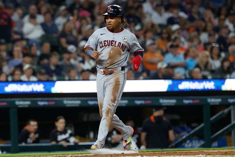 Sep 16, 2025; Detroit, Michigan, USA; Cleveland Guardians third base José Ramírez (11) scores a run  in the sixth inning against the Detroit Tigers hits a single in the sixth inning against the Detroit Tigers at Comerica Park. Mandatory Credit: Rick Osentoski-Imagn Images