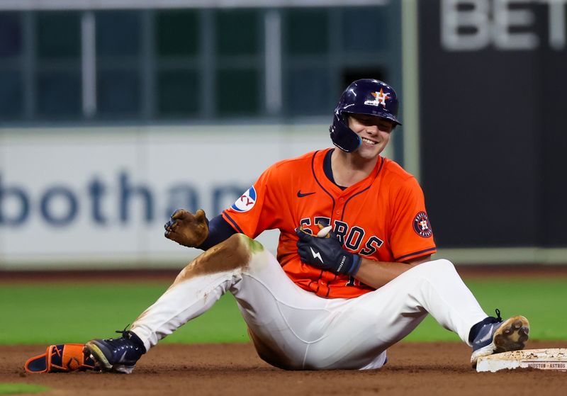 Jun 21, 2024; Houston, Texas, USA; Houston Astros left fielder Joey Loperfido (10) smiles after he hit a RBI double against the Baltimore Orioles in the sixth inning at Minute Maid Park. Mandatory Credit: Thomas Shea-USA TODAY Sports