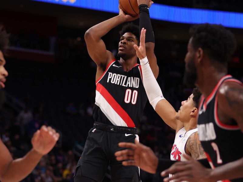 DETROIT, MICHIGAN - NOVEMBER 01: Scoot Henderson #00 of the Portland Trail Blazers takes a shot in front of Killian Hayes #7 of the Detroit Pistons during the first half at Little Caesars Arena on November 01, 2023 in Detroit, Michigan. NOTE TO USER: User expressly acknowledges and agrees that, by downloading and or using this photograph, User is consenting to the terms and conditions of the Getty Images License Agreement. (Photo by Gregory Shamus/Getty Images)
