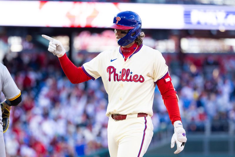 Apr 13, 2024; Philadelphia, Pennsylvania, USA; Philadelphia Phillies third base Alec Bohm (28) reacts after hitting an RBI single during the eighth inning against the Pittsburgh Pirates at Citizens Bank Park. Mandatory Credit: Bill Streicher-USA TODAY Sports