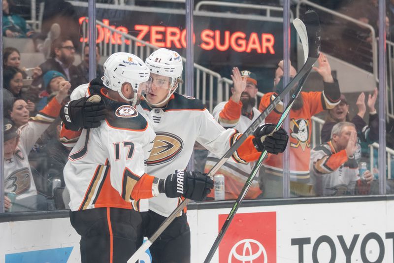 Feb 29, 2024; San Jose, California, USA; Anaheim Ducks center Leo Carlsson (91) and left wing Alex Killorn (17) celebrate after scoring a goal during the first period against the San Jose Sharks at SAP Center at San Jose. Mandatory Credit: Stan Szeto-USA TODAY Sports