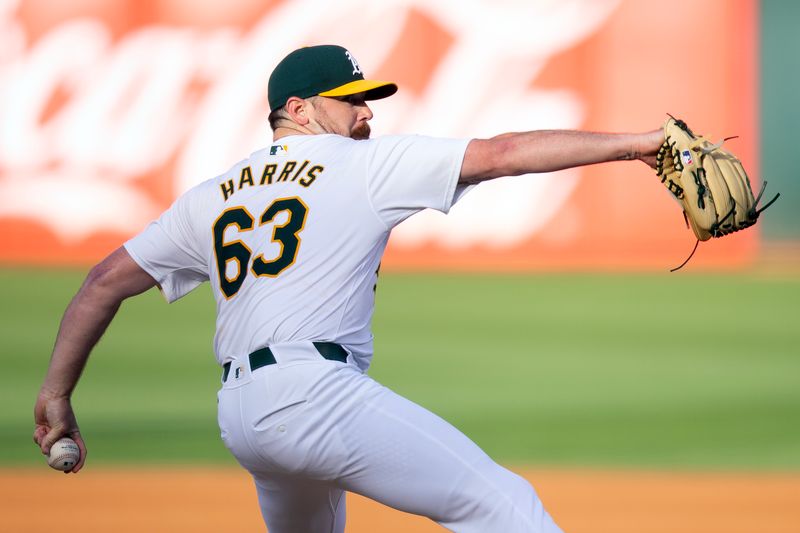 Jun 7, 2024; Oakland, California, USA; Oakland Athletics starting pitcher Hogan Harris (63) delivers a pitch against the Toronto Blue Jays during the first inning at Oakland-Alameda County Coliseum. Mandatory Credit: D. Ross Cameron-USA TODAY Sports