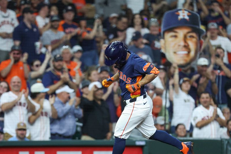 Apr 2, 2024; Houston, Texas, USA; Houston Astros second baseman Jose Altuve (27) rounds the bases after hitting a home run during the fourth inning against the Toronto Blue Jays at Minute Maid Park. Mandatory Credit: Troy Taormina-USA TODAY Sports