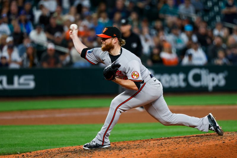 Jul 2, 2024; Seattle, Washington, USA; Baltimore Orioles relief pitcher Craig Kimbrel (46) throws against the Seattle Mariners during the ninth inning at T-Mobile Park. Mandatory Credit: Joe Nicholson-USA TODAY Sports