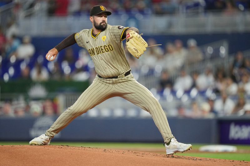 Aug 10, 2024; Miami, Florida, USA;  San Diego Padres starting pitcher Matt Waldron (61) pitches against the Miami Marlins in the first inning at loanDepot Park. Mandatory Credit: Jim Rassol-USA TODAY Sports