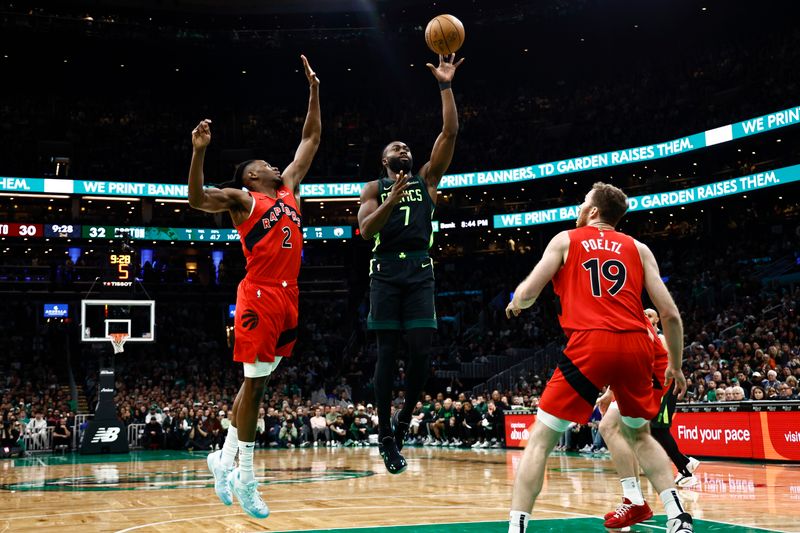 BOSTON, MA - NOVEMBER 16: Jaylen Brown #7 of the Boston Celtics puts up a shot against Jonathan Mogbo #2 of the Toronto Raptors during the second quarter at TD Garden on November 16, 2024 in Boston, Massachusetts. NOTE TO USER: User expressly acknowledges and agrees that, by downloading and/or using this Photograph, user is consenting to the terms and conditions of the Getty Images License Agreement. (Photo By Winslow Townson/Getty Images)