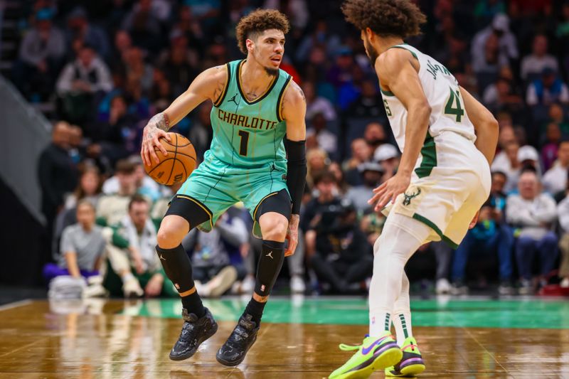 CHARLOTTE, NORTH CAROLINA - NOVEMBER 16: LaMelo Ball #1 of the Charlotte Hornets controls the ball during the first half of a basketball game against the Milwaukee Bucks at Spectrum Center on November 16, 2024 in Charlotte, North Carolina. NOTE TO USER: User expressly acknowledges and agrees that, by downloading and or using this photograph, User is consenting to the terms and conditions of the Getty Images License Agreement. (Photo by David Jensen/Getty Images)