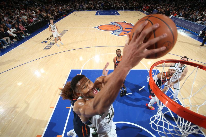 NEW YORK, NY - NOVEMBER 8: Giannis Antetokounmpo #34 of the Milwaukee Bucks dunks the ball during the game against the New York Knicks on November 8, 2024 at Madison Square Garden in New York City, New York.  NOTE TO USER: User expressly acknowledges and agrees that, by downloading and or using this photograph, User is consenting to the terms and conditions of the Getty Images License Agreement. Mandatory Copyright Notice: Copyright 2024 NBAE  (Photo by Nathaniel S. Butler/NBAE via Getty Images)