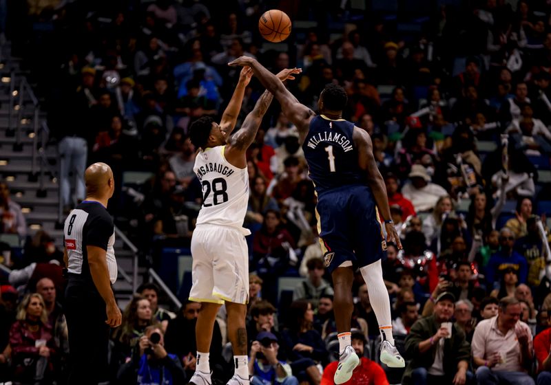 NEW ORLEANS, LOUISIANA - JANUARY 17: Zion Williamson #1 of the New Orleans Pelicans blocks a shot attempt by Brice Sensabaugh #28 of the Utah Jazz during the first half of a game at the Smoothie King Center on January 17, 2025 in New Orleans, Louisiana. NOTE TO USER: User expressly acknowledges and agrees that, by downloading and or using this photograph, User is consenting to the terms and conditions of the Getty Images License Agreement. (Photo by Derick E. Hingle/Getty Images)