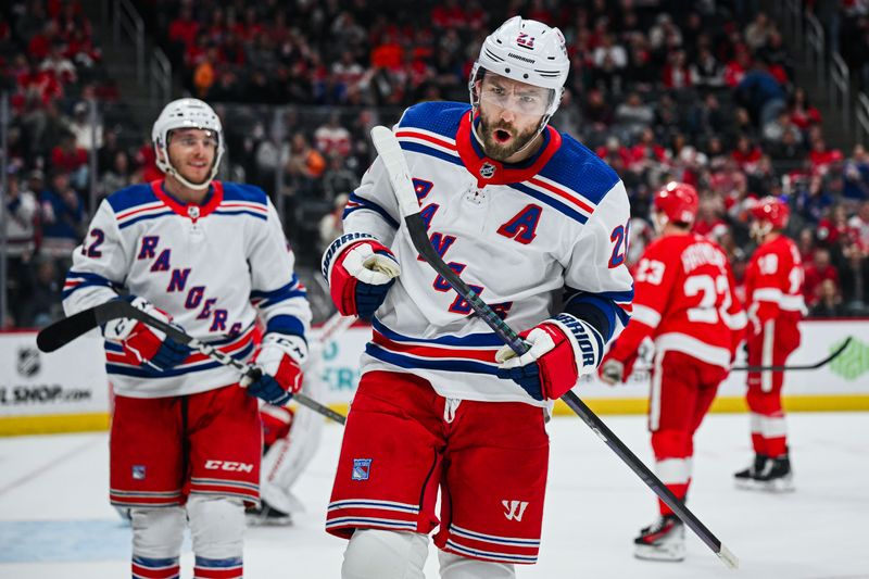 Apr 5, 2024; Detroit, Michigan, USA; New York Rangers center Barclay Goodrow (21) celebrates his goal with center Jonny Brodzinski (22) during the first period against the Detroit Red Wings at Little Caesars Arena. Mandatory Credit: Tim Fuller-USA TODAY Sports