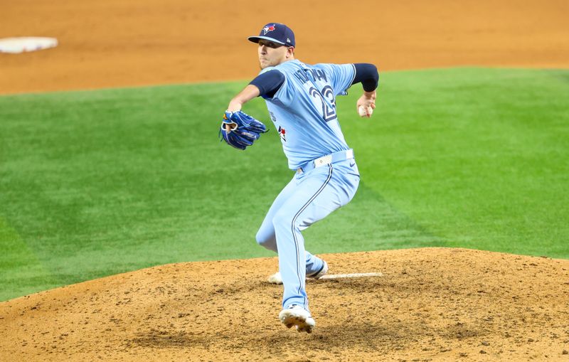 May 28, 2025; Arlington, Texas, USA; Toronto Blue Jays relief pitcher Jeff Hoffman (23) throws during the ninth inning against the Texas Rangers at Globe Life Field. Mandatory Credit: Kevin Jairaj-Imagn Images