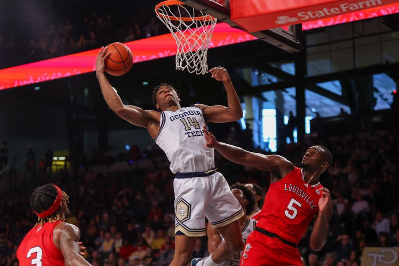 Feb 25, 2023; Atlanta, Georgia, USA; Georgia Tech Yellow Jackets forward Jalon Moore (14) grabs a rebound past Louisville Cardinals forward Brandon Huntley-Hatfield (5) in the second half at McCamish Pavilion. Mandatory Credit: Brett Davis-USA TODAY Sports