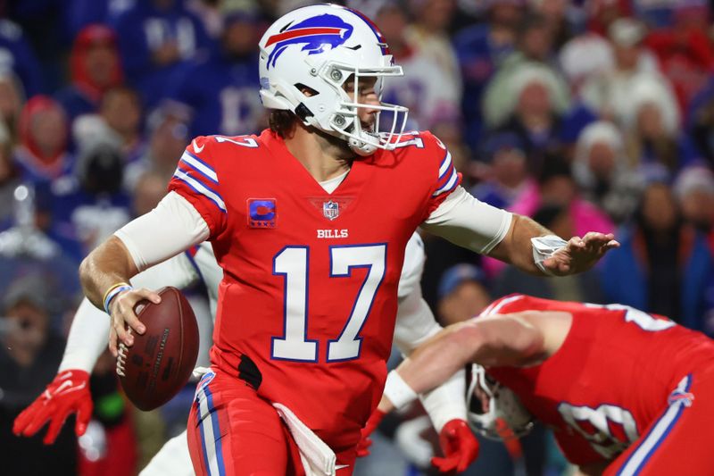 Buffalo Bills quarterback Josh Allen (17) looks for a receiver the first half of an NFL football game against the new York Giants in Orchard Park, N.Y., Sunday Oct. 15, 2023. (AP Photo/ Jeffrey T. Barnes)