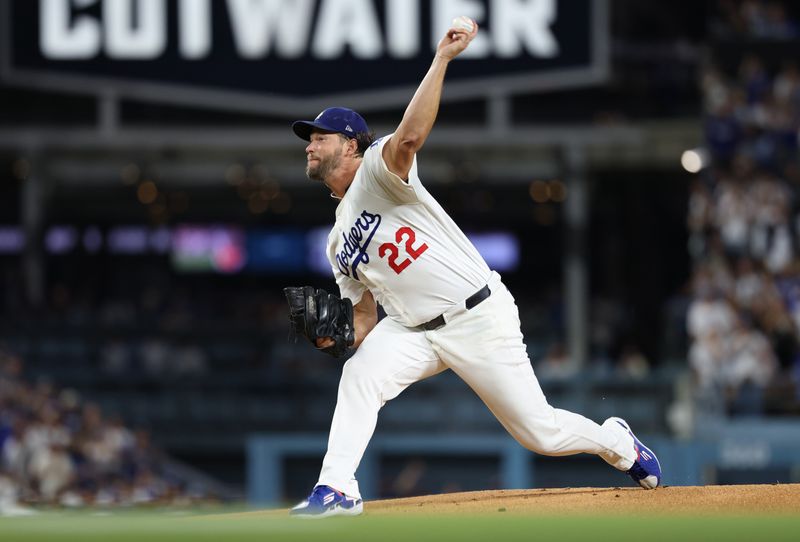 Sep 19, 2025; Los Angeles, California, USA; Los Angeles Dodgers pitcher Clayton Kershaw (22) throws during the first inning against the San Francisco Giants at Dodger Stadium. Mandatory Credit: Kiyoshi Mio-Imagn Images
