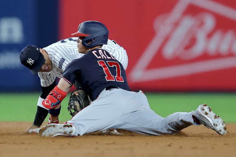 Aug 22, 2023; Bronx, New York, USA; Washington Nationals center fielder Alex Call (17) is tagged out trying to stretch a single to a double by New York Yankees second baseman Gleyber Torres (25) during the fifth inning at Yankee Stadium. Mandatory Credit: Brad Penner-USA TODAY Sports