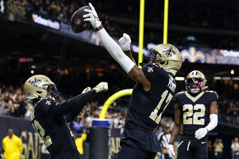 New Orleans Saints wide receiver A.T. Perry (17) celebrates a touchdown in the first half of an NFL football game against the Atlanta Falcons in New Orleans, Sunday, Jan. 7, 2024. (AP Photo/Butch Dill)