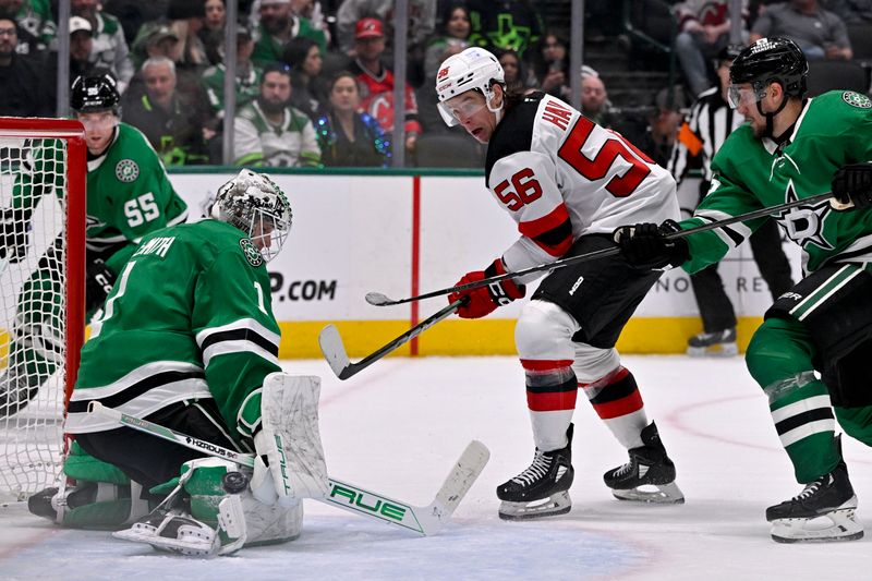 Mar 4, 2025; Dallas, Texas, USA; Dallas Stars goaltender Casey DeSmith (1) stops a shot by New Jersey Devils left wing Erik Haula (56) during the third period at the American Airlines Center. Mandatory Credit: Jerome Miron-Imagn Images