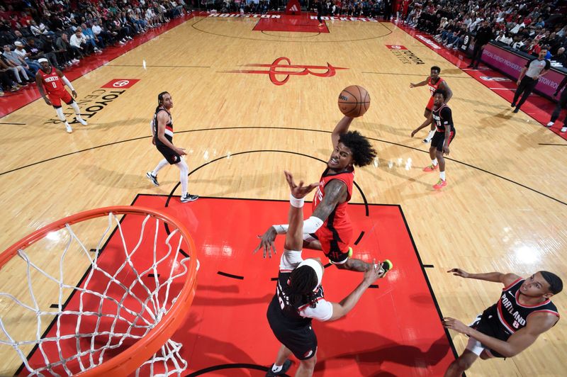 HOUSTON, TX - MARCH 25: Jalen Green #4 of the Houston Rockets drives to the basket during the game against the Portland Trail Blazers on March 25, 2024 at the Toyota Center in Houston, Texas. NOTE TO USER: User expressly acknowledges and agrees that, by downloading and or using this photograph, User is consenting to the terms and conditions of the Getty Images License Agreement. Mandatory Copyright Notice: Copyright 2024 NBAE (Photo by Logan Riely/NBAE via Getty Images)