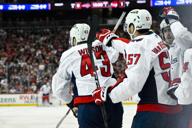 Oct 19, 2024; Newark, New Jersey, USA; Washington Capitals right wing Tom Wilson (43) celebrates with teammates after scoring a goal against the New Jersey Devils during the first period at Prudential Center. Mandatory Credit: John Jones-Imagn Images