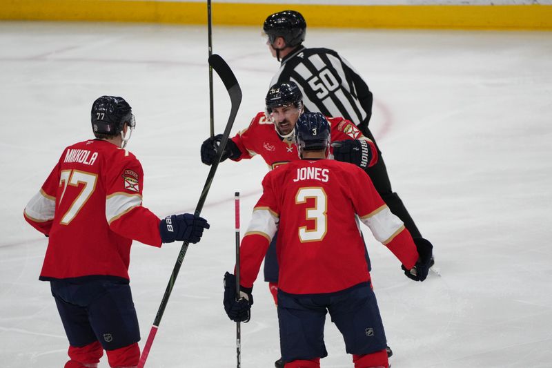 Jun 9, 2025; Sunrise, Florida, USA; Florida Panthers forward Brad Marchand (63) celebrates scoring in the first period against the Edmonton Oilers in game three of the 2025 Stanley Cup Final at Amerant Bank Arena. Mandatory Credit: Jim Rassol-Imagn Images