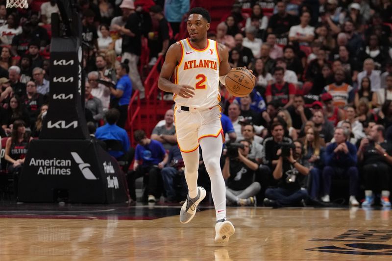 MIAMI, FL - JANUARY 19: Trent Forrest #2 of the Atlanta Hawks dribbles the ball during the game against the Miami Heat on January 19, 2024 at Kaseya Center in Miami, Florida. NOTE TO USER: User expressly acknowledges and agrees that, by downloading and or using this Photograph, user is consenting to the terms and conditions of the Getty Images License Agreement. Mandatory Copyright Notice: Copyright 2024 NBAE (Photo by Eric Espada/NBAE via Getty Images)