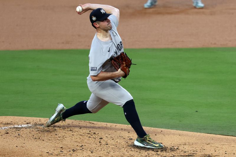 Oct 26, 2024; Los Angeles, California, USA; New York Yankees pitcher Carlos Rodon (55) throws pitch against the Los Angeles Dodgers in the second inning for game two of the 2024 MLB World Series at Dodger Stadium. Mandatory Credit: Kiyoshi Mio-Imagn Images