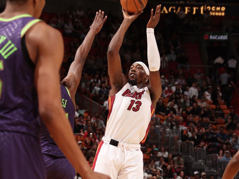 MIAMI, FL - OCTOBER 22: Bam Adebayo #13 of the Miami Heat drives to the basket during the game against the New Orleans Pelicans on January 1, 2025 at Kaseya Center in Miami, Florida. NOTE TO USER: User expressly acknowledges and agrees that, by downloading and or using this Photograph, user is consenting to the terms and conditions of the Getty Images License Agreement. Mandatory Copyright Notice: Copyright 2025 NBAE (Photo by Issac Baldizon/NBAE via Getty Images)