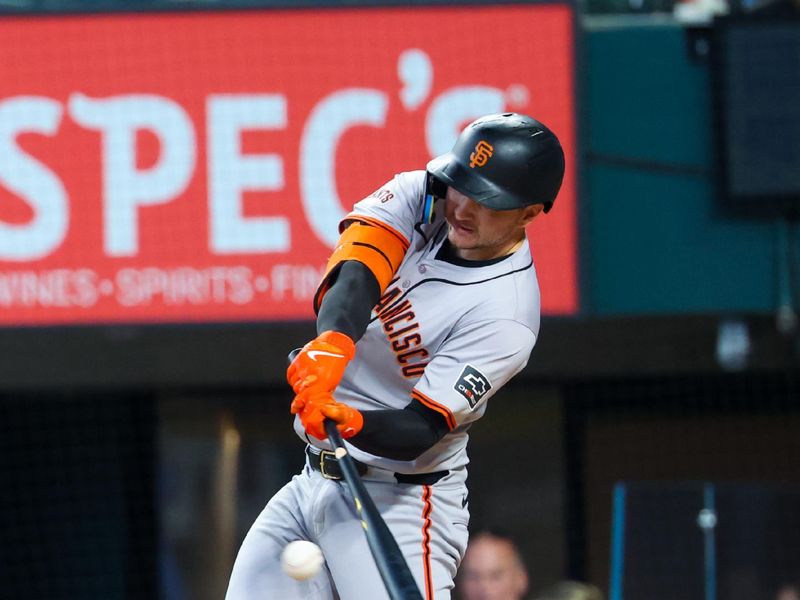 Jun 9, 2024; Arlington, Texas, USA; San Francisco Giants catcher Patrick Bailey (14) hits an rbi single during the third inning against the Texas Rangers at Globe Life Field. Mandatory Credit: Kevin Jairaj-USA TODAY Sports