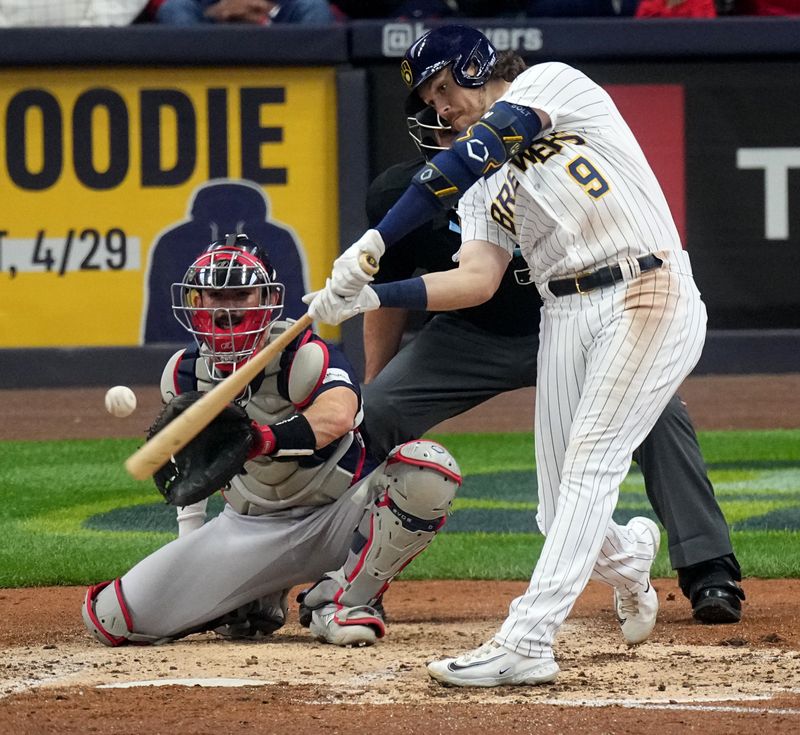 Apr 23, 2023; Milwaukee, Wisconsin, USA; Milwaukee Brewers third baseman Brian Anderson (9) hits a solo home run during the fourth inning of their game against the Boston Red Sox at American Family Field. Mandatory Credit: Mark Hoffman-USA TODAY Sports