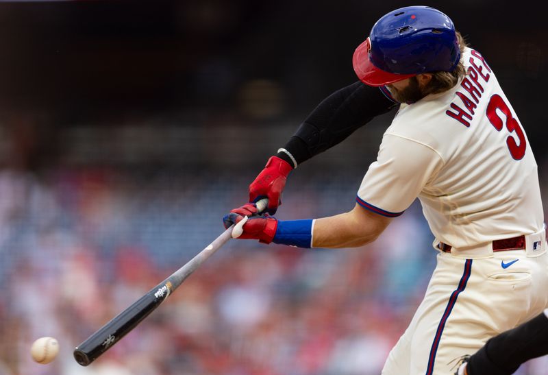 Aug 23, 2023; Philadelphia, Pennsylvania, USA; Philadelphia Phillies designated hitter Bryce Harper (3) hits a single during the fourth inning against the San Francisco Giants at Citizens Bank Park. Mandatory Credit: Bill Streicher-USA TODAY Sports