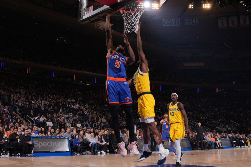 NEW YORK, NY - FEBRUARY 10: Precious Achiuwa #5 of the New York Knicks drives to the basket during the game against the Indiana Pacers on February 10, 2024 at Madison Square Garden in New York City, New York.  NOTE TO USER: User expressly acknowledges and agrees that, by downloading and or using this photograph, User is consenting to the terms and conditions of the Getty Images License Agreement. Mandatory Copyright Notice: Copyright 2024 NBAE  (Photo by Jesse D. Garrabrant/NBAE via Getty Images)