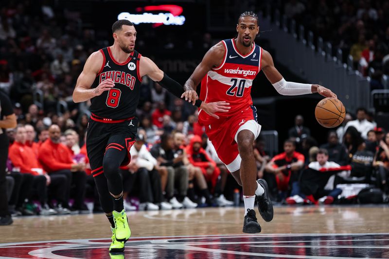 WASHINGTON, DC - JANUARY 01: Alexandre Sarr #20 of the Washington Wizards brings the ball up court against Zach LaVine #8 of the Chicago Bulls during the second half at Capital One Arena on January 1, 2025 in Washington, DC. NOTE TO USER: User expressly acknowledges and agrees that, by downloading and or using this photograph, User is consenting to the terms and conditions of the Getty Images License Agreement. (Photo by Scott Taetsch/Getty Images)