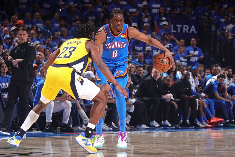OKLAHOMA CITY, OK - JUNE 8: Jalen Williams #8 of the Oklahoma City Thunder looks on during the game against the Indiana Pacers during Game Two of the 2025 NBA Finals on June 8, 2025 at Paycom Center in Oklahoma City, Oklahoma. NOTE TO USER: User expressly acknowledges and agrees that, by downloading and or using this photograph, User is consenting to the terms and conditions of the Getty Images License Agreement. Mandatory Copyright Notice: Copyright 2025 NBAE(Photo by Nathaniel S. Butler/NBAE via Getty Images)