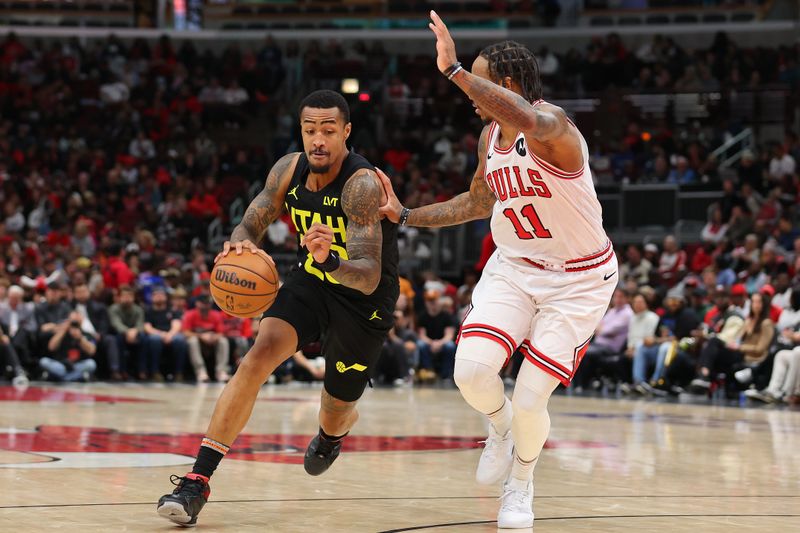 CHICAGO, ILLINOIS - NOVEMBER 06: John Collins #20 of the Utah Jazz drives to the basket against DeMar DeRozan #11 of the Chicago Bulls during the second half at the United Center on November 06, 2023 in Chicago, Illinois. NOTE TO USER: User expressly acknowledges and agrees that, by downloading and or using this photograph, User is consenting to the terms and conditions of the Getty Images License Agreement. (Photo by Michael Reaves/Getty Images)